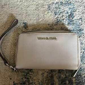 Like new grey Michael Kors wristlet!